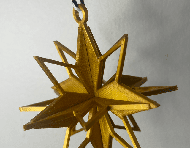 Décoration de sapin étoile doré